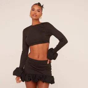 Long Sleeve Puffball Cuff Crop Top In Black Rib